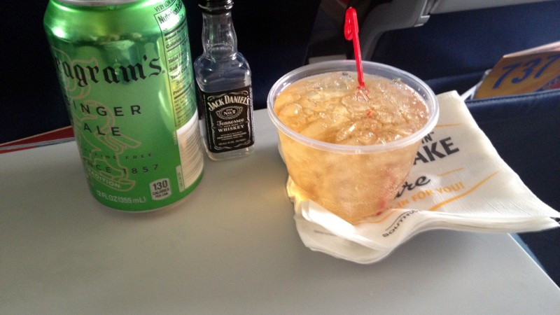 We all hit the liquor on the plane; Toby even got cut off from more by a flight attendant.
