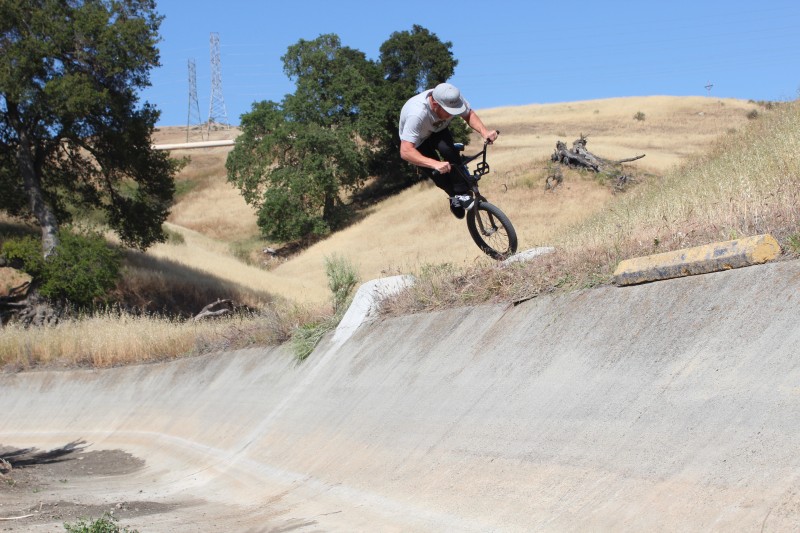 Dusty with a can-jam on an errant bag of petrified quickcrete.